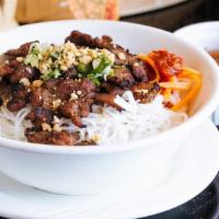 Pork Vermicelli · Bun Thit Nuong - Vermicelli noodles, bean sprouts, lettuce, cucumber, daikon, peanuts, chili...