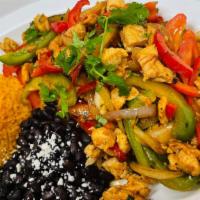 Fajitas · Sautée vegetables mixed with choice of one meat served with rice, beans, flour tortilla, sou...