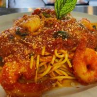 Spaghetti Shrimp Fradiavio · Sautéed shrimp with hot chili peppers, marinara sauce over spaghetti pasta.