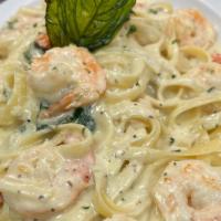 Fettuccine With Shrimp · shrimp with alfredo cream sauce over fettuccine pasta.