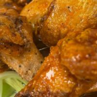 Hot & Sweet Wings · 10pc wings topped with Homemade hot and sweet sauce side of  blue cheese and celery.