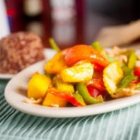Sweet & Sour · Stir-fried pineapple chunks with vegetables in Thai style sweet and sour sauce.