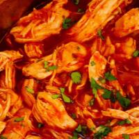 Chipotle Pulled Chicken · Smoked with peppers, onions, and chipotle peppers.