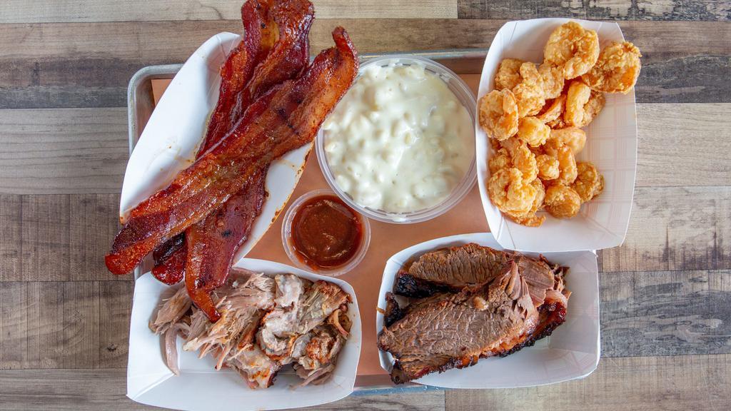 Combo Platter · Choice of any 3 meats. Served with 2 sides.