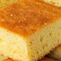 Corn Bread & Honey Butter · Our giant fresh baked corn bread served with whipped honey butter.