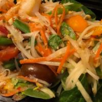 Papaya Salad (Som Tum) · Freshly shredded green papaya, carrot, tomato, green beans, and roasted peanut with a zesty ...