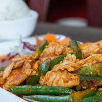 Pad Prik King · This peppery wok dish is infused with sauteed string beans and kaffir lime leaves, belle pep...