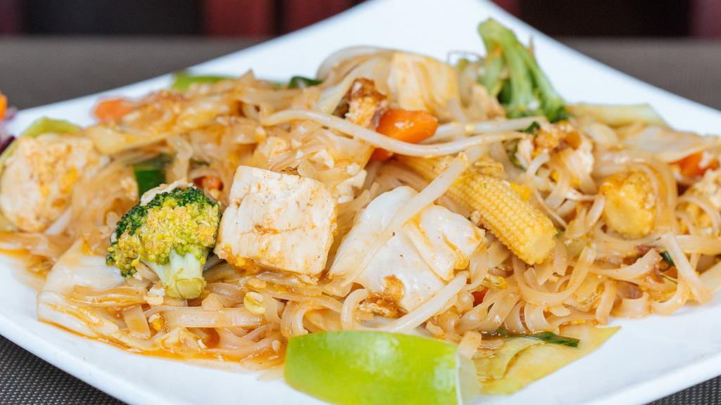 Ultimate Pad Thai · Stir fried thin rice noodles with egg, tofu, bean sprouts in tamarind sauce topped with crushed  peanuts. It’s Thailand's gift to the world.