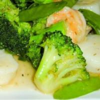 Shrimp & Scallop In House Sauce / 干貝蝦 · Shrimp, scallop, snap pea, mushroom, and spicy house sauce. Served with steamed rice. / 蝦, 干...