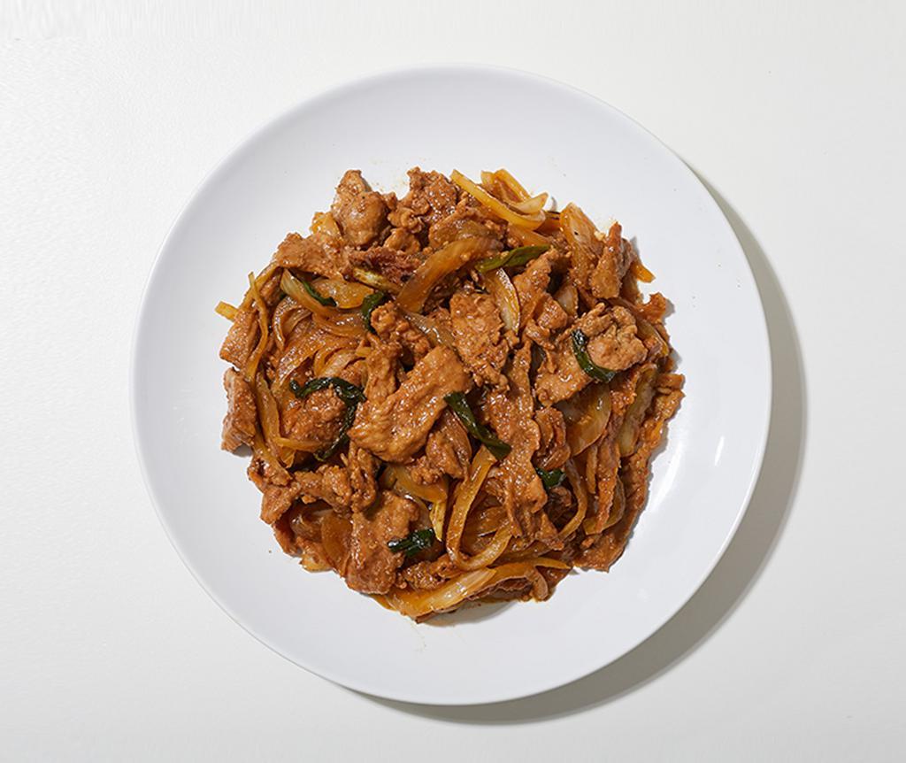 Mongolian Beef · Tender sliced steak wok fried with scallions, and white onions with soy sauce.