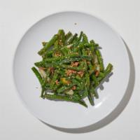 Chinese String Beans · Spicy chili sautéed with string beans in a chili garlic brown sauce.