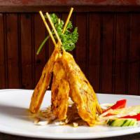 Satay · Chicken marinated in thai spices, coconut milk, and grilled to perfection. Served on skewers...