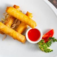 Veggie Roll · Fried spring roll filled with mixed vegetables and cellophane noodles. Served with sweet and...