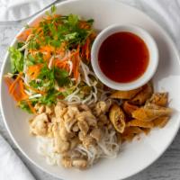 Cold Noodle Salad · Rice Vermicelli noodles, lettuce, cilantro,  crispy egg rolls, topped with your choice of me...