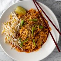 Pad Thai · Most popular dish! Stir fry rice noodle, bean sprout, egg, and ground peanut and chopped gre...