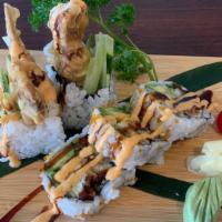 Spider Maki · Fried softshell crab, avocado, cucumber with eel sauce.