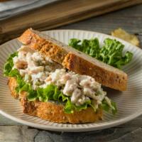Chicken Salad Sandwich · Chicken breast salad, lettuce, tomato, mayo on  Sesame Baguette
