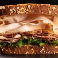 Smoked Gouda & Turkey · Roasted turkey breast, smoked Gouda cheese, spinach roasted red pepper, red onion with honey...
