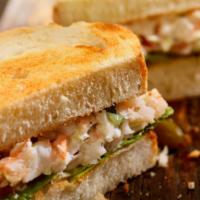 Shrimp Salad Sandwich · Shrimp salad, avocado, lettuce on our Sesame Baguette