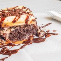 Funnel Cake Waffle Ice Cream Sandwich · Your favorite flavor of ice cream scooped between two waffle triangles, served with your cho...