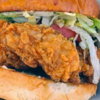 Classic Chicken Sandwich · Buttermilk fried chicken, house mayo, lettuce, tomato, on a soft roll.