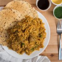 Chicken Biriyani · Chicken marinated with spices and saffron, then steam cooked naturally fragrant basmati rice...