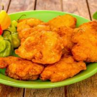 Codfish Fritters · 3 pieces.made with shredded salted codfish Jamaican hot peppers, tomatoes, scallions and sau...