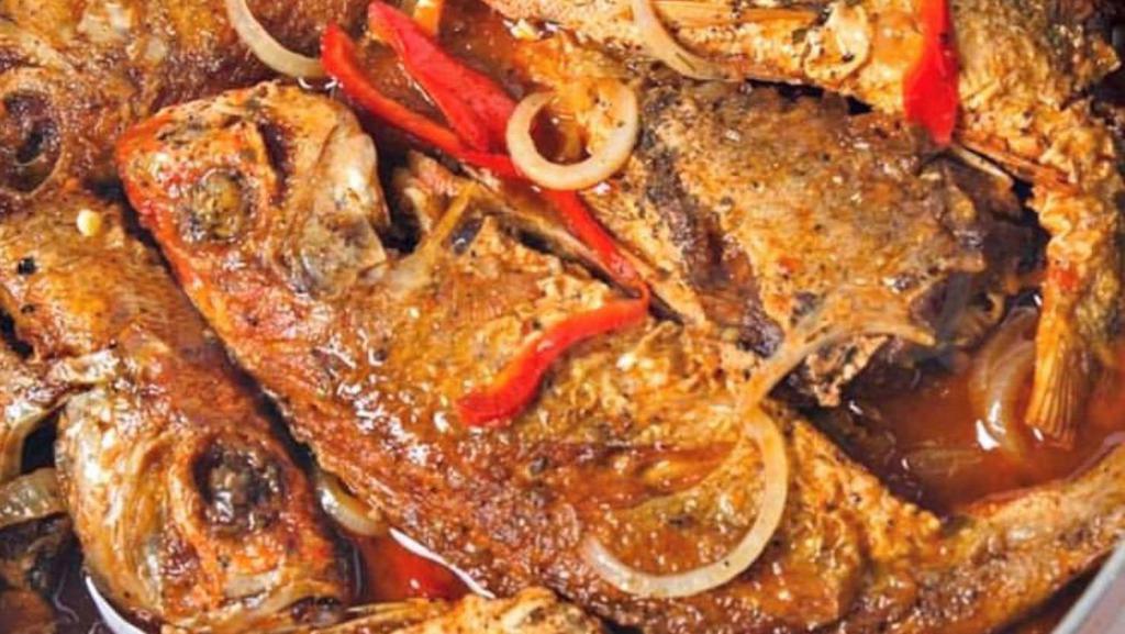 Large Whole Red Snapper Platter · 3/4 to 1 lbs whole wild red snapper Escovitch style, Brown stewed style, or Steamed style, served with a choice of rice and 1 side.