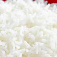 Steamed White Rice · Long grained white rice steamed with butter to perfection.