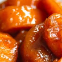 Candy Yams · Sweet tender baked candied yams.