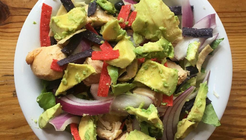 Holy Chipotle · Your choice of greens, chicken, red onion, black bean relish, smashed avocado, tortilla chips with chipotle dressing