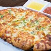 Cheesy Breadsticks · freshly baked breadsticks topped with roasted garlic spread and farmers cheese, served with ...