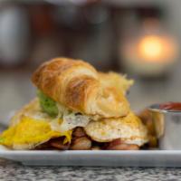 Egg & Cheese · Two eggs, Swiss on your choice of everything, wheat or plain bagel.  Vegetarian