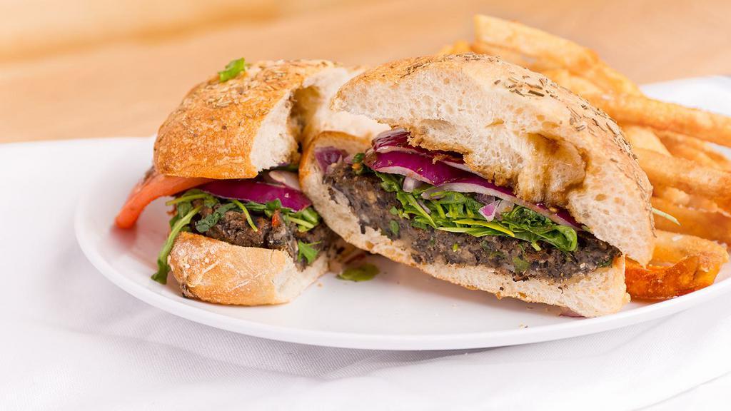 Black Bean Burger · Vegetarian. UNAVAILABLE Avocado, red onion, tomato, and arugula dressed with balsamic-orange sauce and served on foccacia.
