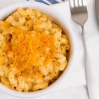 Mac And Cheese · Housemade cheese sauce and macaroni