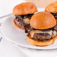 Beef Sliders · Three sliders with provolone, caramelized onions, tomato ragout, mumba sauce.