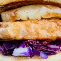 Hawaiian Salmon Burger · ¼ lb. patty, red cabbage slaw, pineapple, ginger vinaigrette, and barbecue glaze.