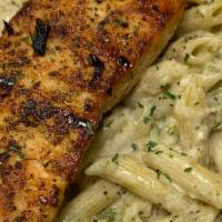 Salmon Alfredo · Penne noodles mixed with spinach & broccoli  in Homemade Alfredo sauce topped with seasoned ...