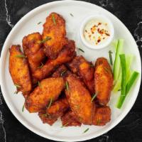 The Origin Wings · Fresh chicken wings breaded and fried until golden brown.