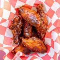 Smoking Bbq Chicken Wings · Fresh chicken wings breaded, fried until golden brown, and tossed in barbecue sauce.