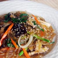 Japchae · Pan-fried vermicelli noodles with assorted vegetables beef, and mushroom.