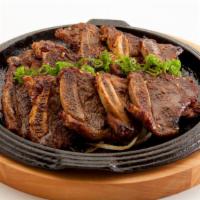 La Galbi · Marinated beef ribs (three strips)
