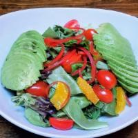 Avocado Salad · Avocado salad with avocado, red peppers, red lettuce, tomatoes & oranges with agave lime vin...
