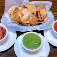 Chips Salsa · Fresh made salsa rojo or verde served with fresh fried tortilla chips