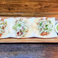 Crispy Fish Taco.. · With spicy cabbage slaw, 3 per order. Soft tortillas only.