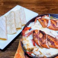 Chicken Fajitas. · Grilled onion, red & green peppers, Oaxaca cheese & corn tortillas. Served with white rice.