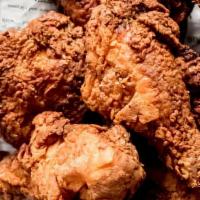 ‘On The Bone’ Fried Chicken · Half chicken cut into 4 pieces and buttermilk battered. Served with french fries and cole sl...