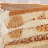 Salted Caramel Crunch Cake · Light buttery vanillia flecked caked with waves of caramel and layered with salted caramel c...