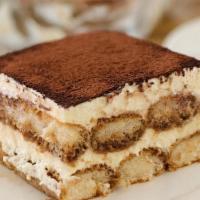 Tiramisu · Layers of Sponge Cake Soaked in Coffee Cocoa Powder and Mascarpone Cheese.