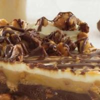 Reese'S Peanut Butter Pie · Filled with Peanut Butter and Chocolate Mousses, Chocolate Chips, Peanuts, and Reese's Peanu...